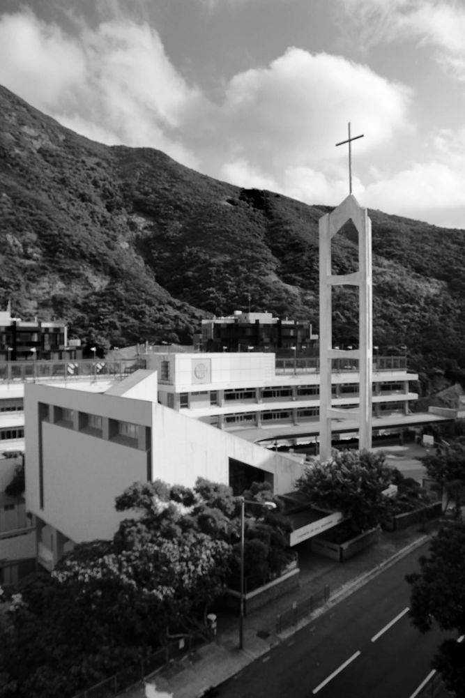 Church of All Nations cross tower with the Hong Kong International School Upper Primary building in the background.