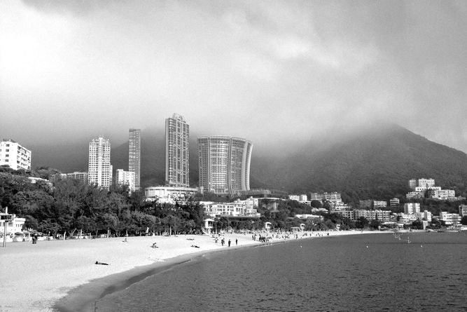 Repulse Bay with heavy cloud cover on the mountain behind.