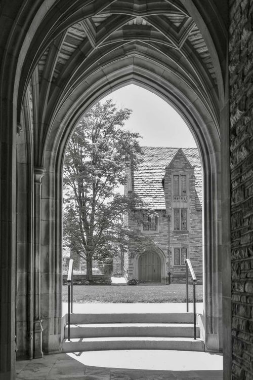 Arched Guenther Hall - J Dorm entrance looking across the quad at Schaller Hall - F Dorm. 